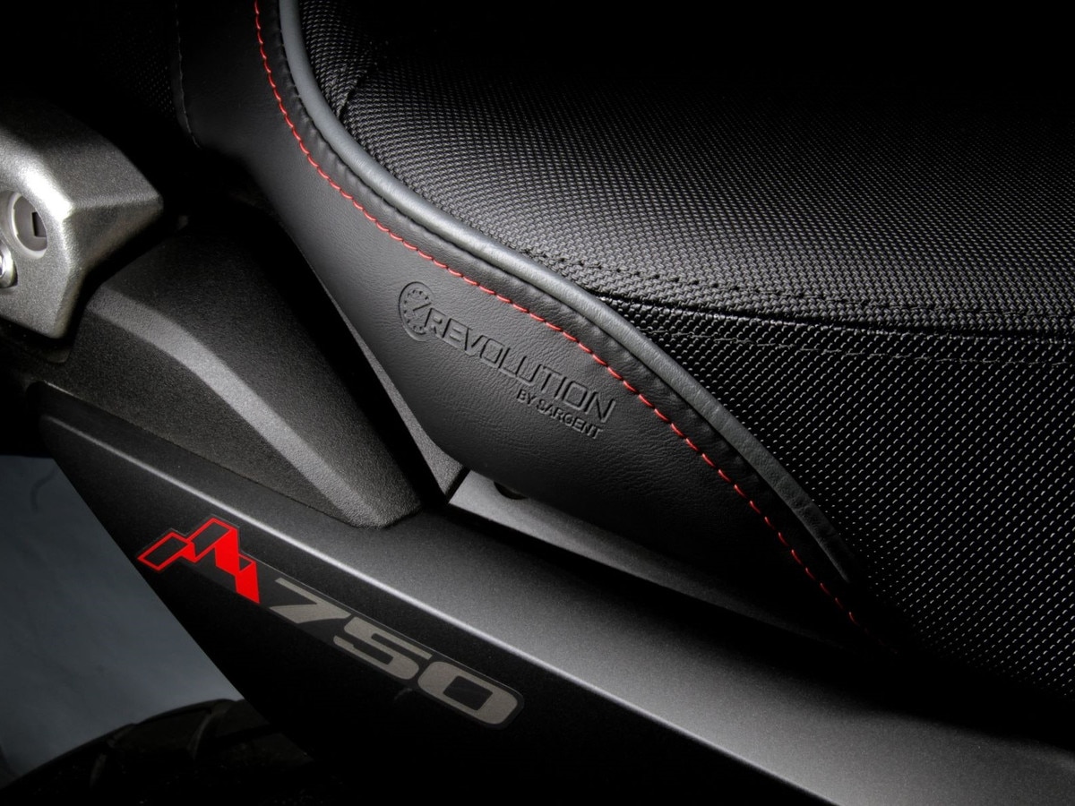 Embossed REVolution logo is an elegant touch on Sargent's REVolution and DIY kits for the Honda Transalp available on the CFX all black version.